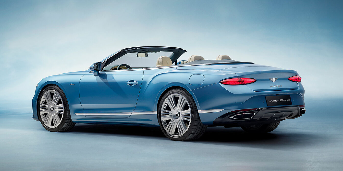 Bentley Guatemala New Bentley Continental GTC Azure convertible rear view in Light Windsor blue paint with 22 inch ten spoke wheels and chrome exterior details