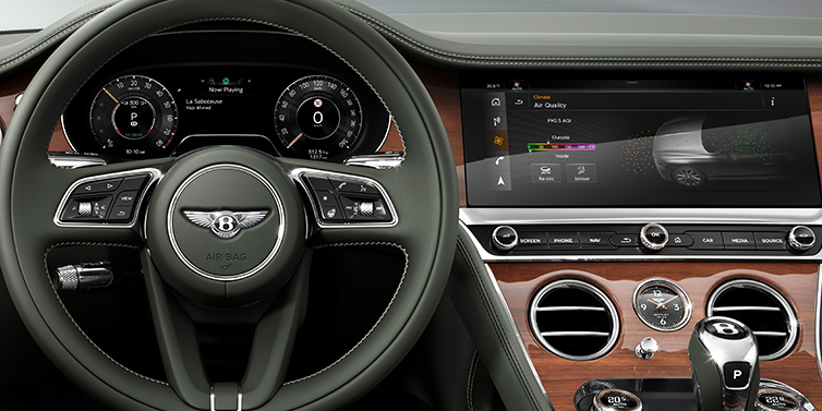 Bentley Guatemala New Bentley Continental GTC convertible front interior steering wheel view, with Beluga black leather and Crown Cut walnut veneer